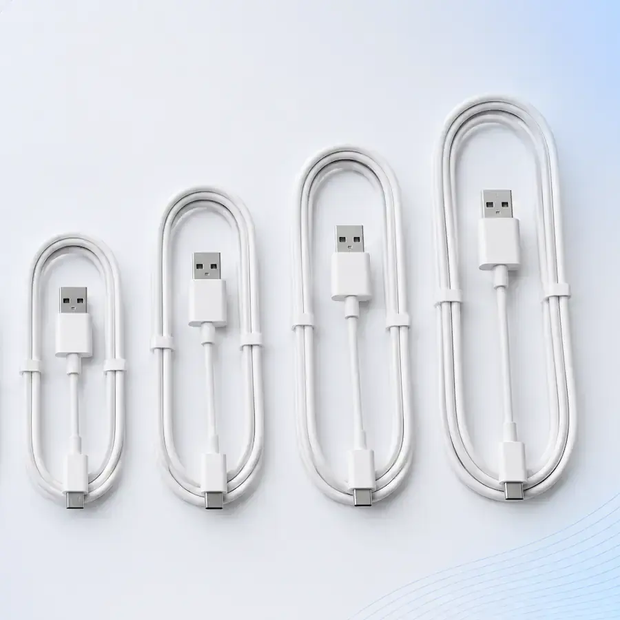 Кабелі USB, USB Type-C, Lightning і HDMI різної довжини — від коротких до довгих — акуратно розкладені на світлому фоні для порівняння розмірів.