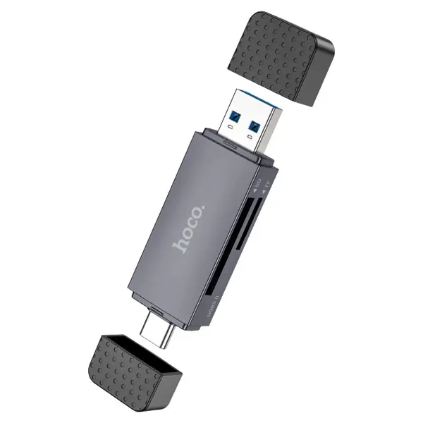 Картрідер HOCO HB45 Spirit USB, Type-C, SD, TF, microSD сірий (HB45 Spirit, card reader, USB-A + Type-C to SD + TF 1. Card reader USB-A + Type-C to SD + TF. 2. Theoretical transfer speed: USB-A / Type-C [USB2.0] – 480Mbps.  Type-C [USB3.0] – 5Gbps. 3. Supports up to 2Tb memory card. 4. Supports TF / SD simultaneous reading and writing. 5. Supports mobile phones, cameras, dash cameras and other devices. 6. Working voltage / current: 5V / 100mA. 7. Material: ABS. 8. Sizes: 70 × 20.5 × 11mm. 9. Weight: 11.2g.) від батарейки.com.ua