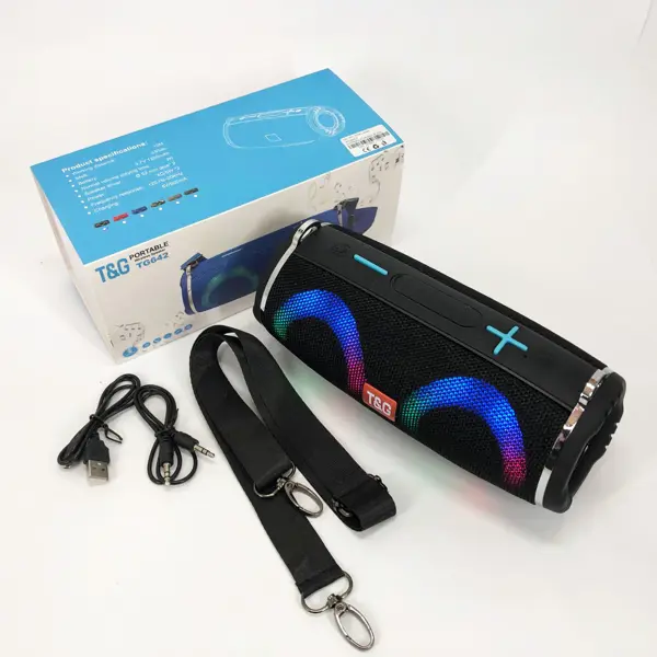 Портавтина колонка T&G TG642 Bluetooth 5.0, RGB Led, TWS, AUX, TF, USB, чорна (Портативна колонка TG642 з RGB підсвічуванням і ремінцем   Bluetooth 5.0: швидке підключення і стабільний сигнал, сумісний з усіма пристроями Bluetooth. Акумулятор 1200 мАг: до 10 годин відтворення на середній гучності (2/3) при повній зарядці. Сітчаста кришка: захищає динамік від води, пилу та ударів. Висока потужність 5 Вт * 2: два низькочастотних динаміка з кожного боку, вібрують під час відтворення музики. 360-градусний стереозвук: циліндрична форма і вбудовані лівий і правий канали. Функція дзвінка: вбудований мікрофон із шумозаглушенням дає змогу відповідати на дзвінки, не торкаючись телефона. Функція TWS: можливість синхронізації двох динаміків з одним телефоном. Підтримка USB-флеш-накопичувача: відтворення музики з флешки. Підтримка карт TF або microSD ємністю до 32 ГБ, підтримка USB 2.0. Підтримка зовнішнього входу AUX: підключення MP3/MP4 плеєрів, комп'ютерів та інших аудіопристроїв. Керування кнопками: увімкнення/вимкнення, відтворення/пауза, перемикання режиму, перемикання пісень, регулювання гучності тощо. Багатофункціональність: не тільки Bluetooth-динамік, а й радіо, дротовий динамік, портативна колонка з потужним басом. Характеристики:  Версія Bluetooth: 5.0 Діапазон: 10 м Відношення сигнал/шум: ≥ 95 дБ Ємність акумулятора: 1200 мАг Вбудована напруга: 3,7 В Час відтворення: 10 годин (на середній гучності) Динамік: φ57 мм x 2 Потужність динаміка: 4 Ом / 5 Вт x 2 Частота: 120 Гц - 20 кГц Розміри: 223 x 96 x 105 мм Вага: 750 г Комплектація:  Bluetooth-динамік x 1 USB-кабель для заряджання x 1 Аудіокабель AUX x 1 Плечовий ремінь x 1 Посібник користувача x )  від батарейки.com.ua